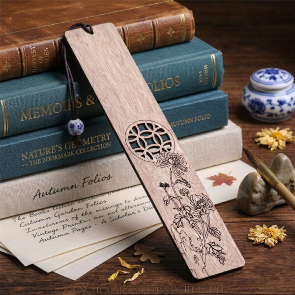 Light wood bookmark with detailed chrysanthemum carving resting on old manuscript pages and stacked antique books.